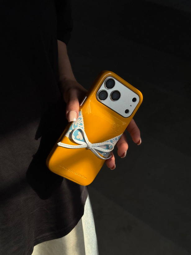 قاب پافری خردلی طرح Bikini مخصوص آیفون 17 پرو مکس | Mustard Puffer Bikini Case for iPhone 17 Pro Max