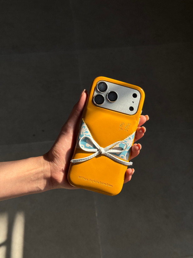 قاب پافری خردلی طرح Bikini مخصوص آیفون 17 پرو مکس | Mustard Puffer Bikini Case for iPhone 17 Pro Max